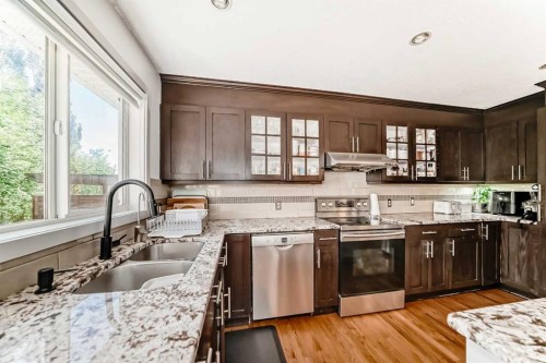 191 Sienna Park Terrace Sw, Calgary, AB - Indoor Photo Showing Kitchen With Double Sink