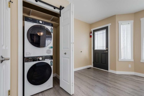 28 Hidden Point Nw, Calgary, AB - Indoor Photo Showing Laundry Room