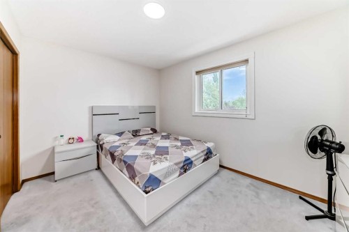 81 Eldorado Close Ne, Calgary, AB - Indoor Photo Showing Bedroom