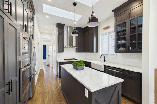 11 Royston Park Nw, Calgary, AB - Indoor Photo Showing Kitchen With Upgraded Kitchen