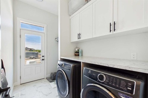 11 Royston Park Nw, Calgary, AB - Indoor Photo Showing Laundry Room
