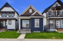 11 Royston Park Nw, Calgary, AB  - Outdoor With Facade 