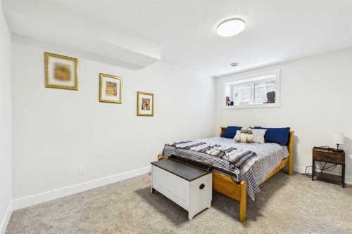 11 Royston Park Nw, Calgary, AB - Indoor Photo Showing Bedroom