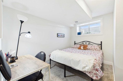 11 Royston Park Nw, Calgary, AB - Indoor Photo Showing Bedroom
