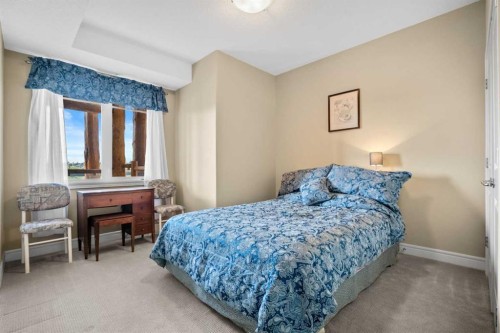 2303-2330 Fish Creek Boulevard Sw, Calgary, AB - Indoor Photo Showing Bedroom