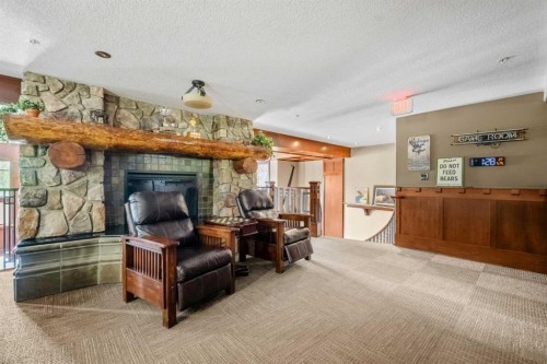 2303-2330 Fish Creek Boulevard Sw, Calgary, AB - Indoor With Fireplace