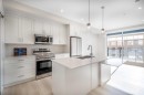 7202-1802 Mahogany Boulevard Se, Calgary, AB  - Indoor Photo Showing Kitchen With Double Sink With Upgraded Kitchen 