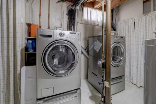2328 Munro Drive Ne, Calgary, AB - Indoor Photo Showing Laundry Room