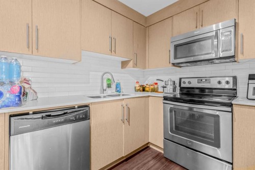 5404-302 Skyview Ranch Drive Ne, Calgary, AB - Indoor Photo Showing Kitchen With Stainless Steel Kitchen With Double Sink