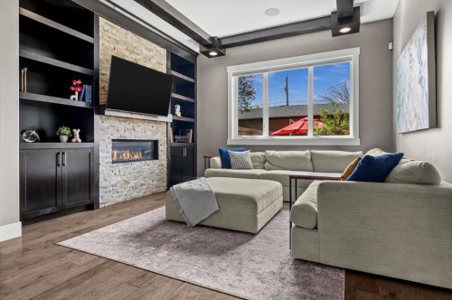 449 28 Avenue Nw, Calgary, AB - Indoor Photo Showing Living Room With Fireplace