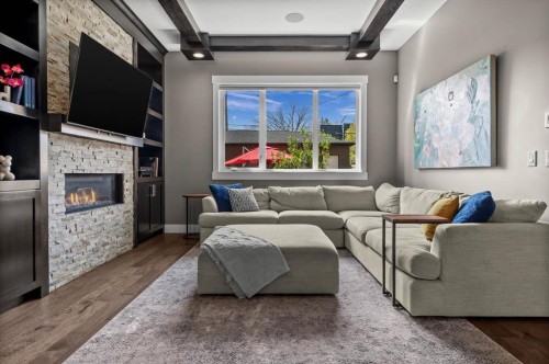 449 28 Avenue Nw, Calgary, AB - Indoor Photo Showing Other Room With Fireplace