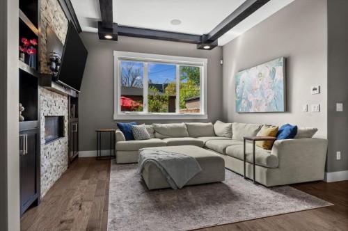 449 28 Avenue Nw, Calgary, AB - Indoor Photo Showing Living Room With Fireplace