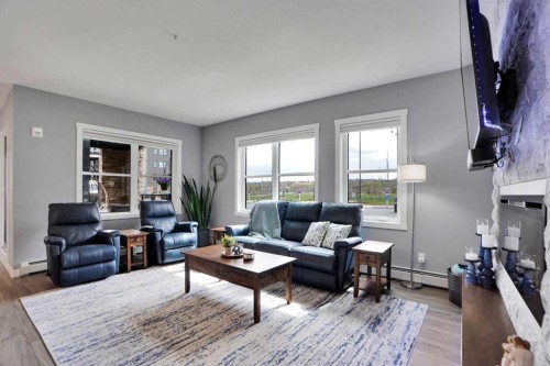 105-55 Wolf Hollow Crescent Se, Calgary, AB - Indoor Photo Showing Living Room