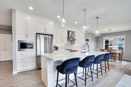 105-55 Wolf Hollow Crescent Se, Calgary, AB - Indoor Photo Showing Kitchen With Stainless Steel Kitchen With Upgraded Kitchen