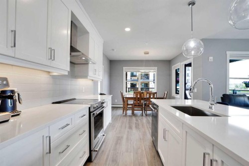 105-55 Wolf Hollow Crescent Se, Calgary, AB - Indoor Photo Showing Kitchen With Upgraded Kitchen