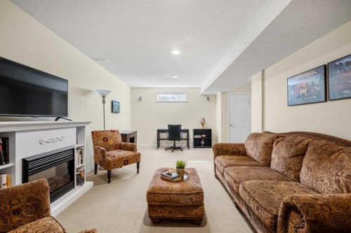 268 Douglas Woods Drive Se, Calgary, AB - Indoor Photo Showing Living Room With Fireplace