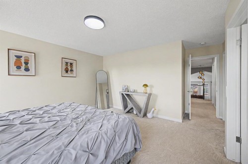 53 Fireside Crescent, Cochrane, AB - Indoor Photo Showing Bedroom