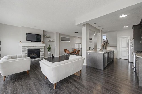 53 Fireside Crescent, Cochrane, AB - Indoor Photo Showing Living Room With Fireplace