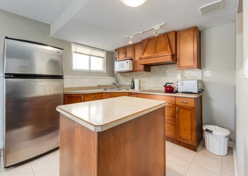 10012 Oakfield Drive Sw, Calgary, AB - Indoor Photo Showing Kitchen With Double Sink