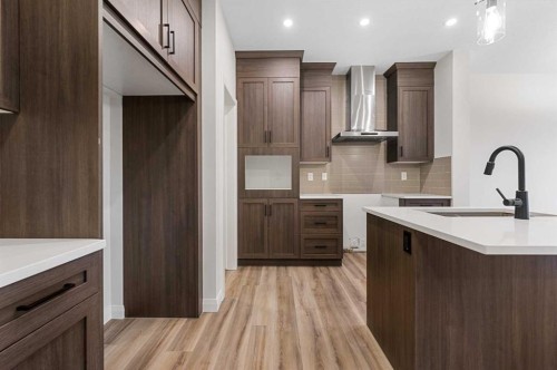 72 Dawson Wharf Mount, Chestermere, AB - Indoor Photo Showing Kitchen With Upgraded Kitchen