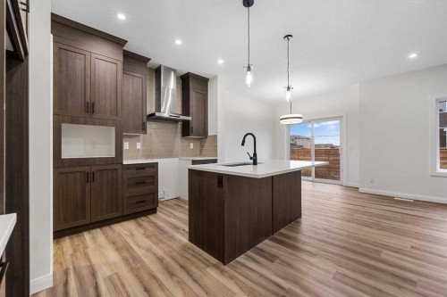72 Dawson Wharf Mount, Chestermere, AB - Indoor Photo Showing Kitchen With Upgraded Kitchen