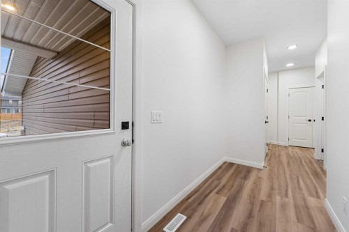 72 Dawson Wharf Mount, Chestermere, AB - Indoor Photo Showing Other Room