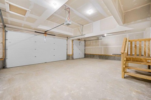 72 Dawson Wharf Mount, Chestermere, AB - Indoor Photo Showing Garage
