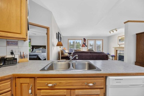 5611 Sunrise Crescent, Olds, AB - Indoor Photo Showing Kitchen With Double Sink