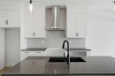 307 Dawson Dock Way, Chestermere, AB  - Indoor Photo Showing Kitchen With Upgraded Kitchen 