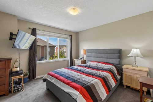 213 Copperpond Villas Se, Calgary, AB - Indoor Photo Showing Bedroom