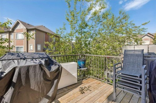 213 Copperpond Villas Se, Calgary, AB - Outdoor With Deck Patio Veranda With Exterior