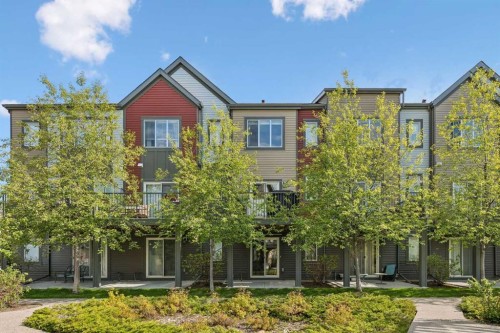 213 Copperpond Villas Se, Calgary, AB - Outdoor With Facade