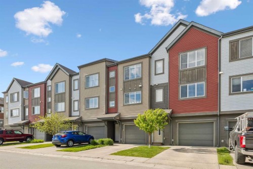 213 Copperpond Villas Se, Calgary, AB - Outdoor With Facade
