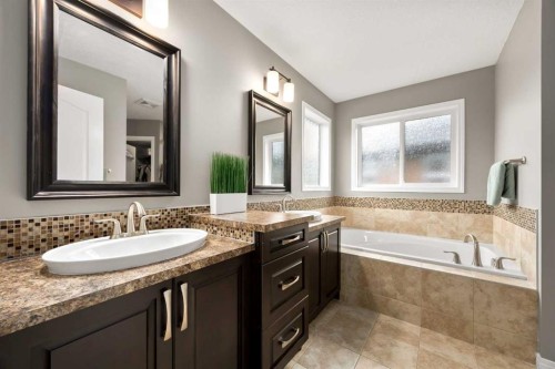 77 Cougar Ridge Cove Sw, Calgary, AB 