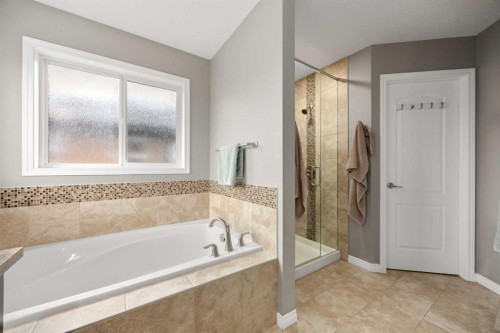 77 Cougar Ridge Cove Sw, Calgary, AB 