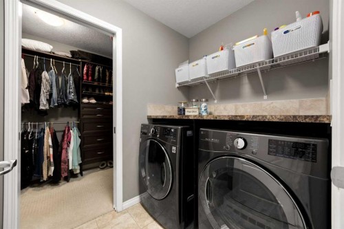 77 Cougar Ridge Cove Sw, Calgary, AB 