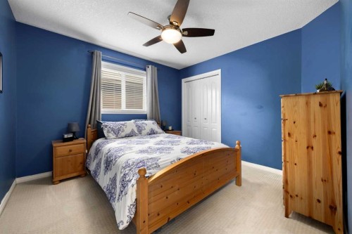 77 Cougar Ridge Cove Sw, Calgary, AB 