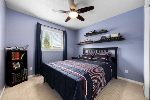 77 Cougar Ridge Cove Sw, Calgary, AB 