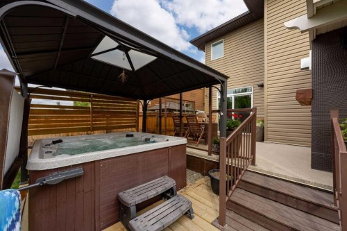 77 Cougar Ridge Cove Sw, Calgary, AB 