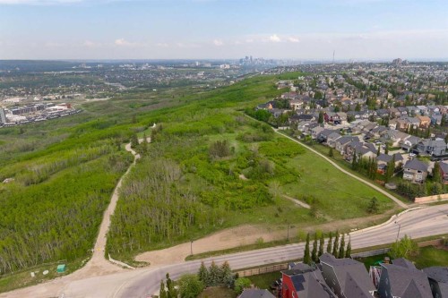 77 Cougar Ridge Cove Sw, Calgary, AB 