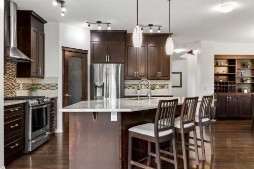 77 Cougar Ridge Cove Sw, Calgary, AB 