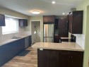 2015 Milne Drive Ne, Calgary, AB  - Indoor Photo Showing Kitchen With Double Sink 