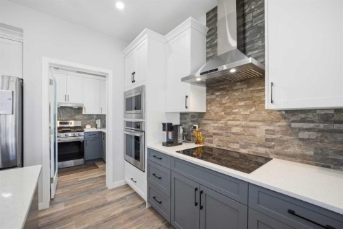 1153 Chinook Gate Bay Sw, Airdrie, AB - Indoor Photo Showing Kitchen With Upgraded Kitchen