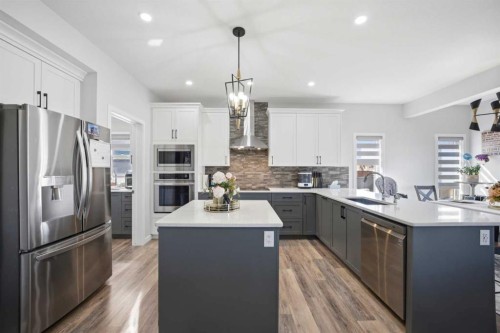 1153 Chinook Gate Bay Sw, Airdrie, AB - Indoor Photo Showing Kitchen With Stainless Steel Kitchen With Upgraded Kitchen