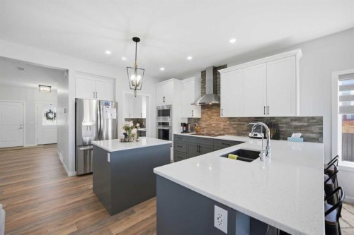 1153 Chinook Gate Bay Sw, Airdrie, AB - Indoor Photo Showing Kitchen With Stainless Steel Kitchen With Upgraded Kitchen