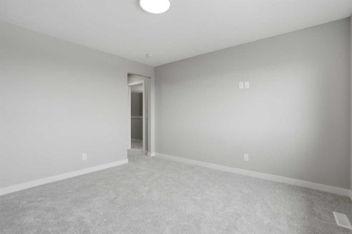311 Dawson Dock Way, Chestermere, AB - Indoor Photo Showing Other Room