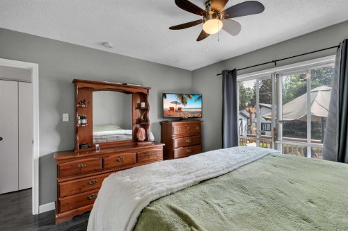 249 Acadia Drive Se, Calgary, AB - Indoor Photo Showing Bedroom