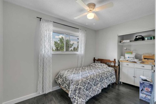 249 Acadia Drive Se, Calgary, AB - Indoor Photo Showing Bedroom