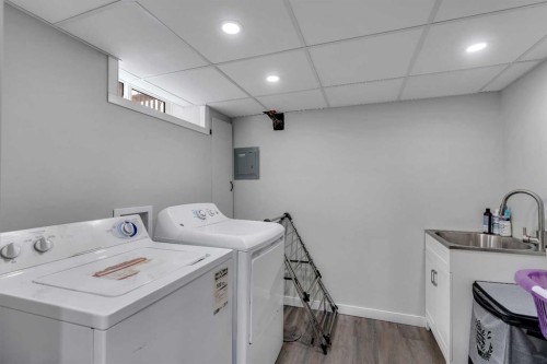 249 Acadia Drive Se, Calgary, AB - Indoor Photo Showing Laundry Room