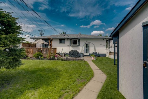 249 Acadia Drive Se, Calgary, AB - Outdoor With Deck Patio Veranda